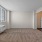 a room with a window and air conditionig unit